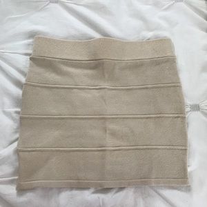 Beige mini skirt. Stretchy.